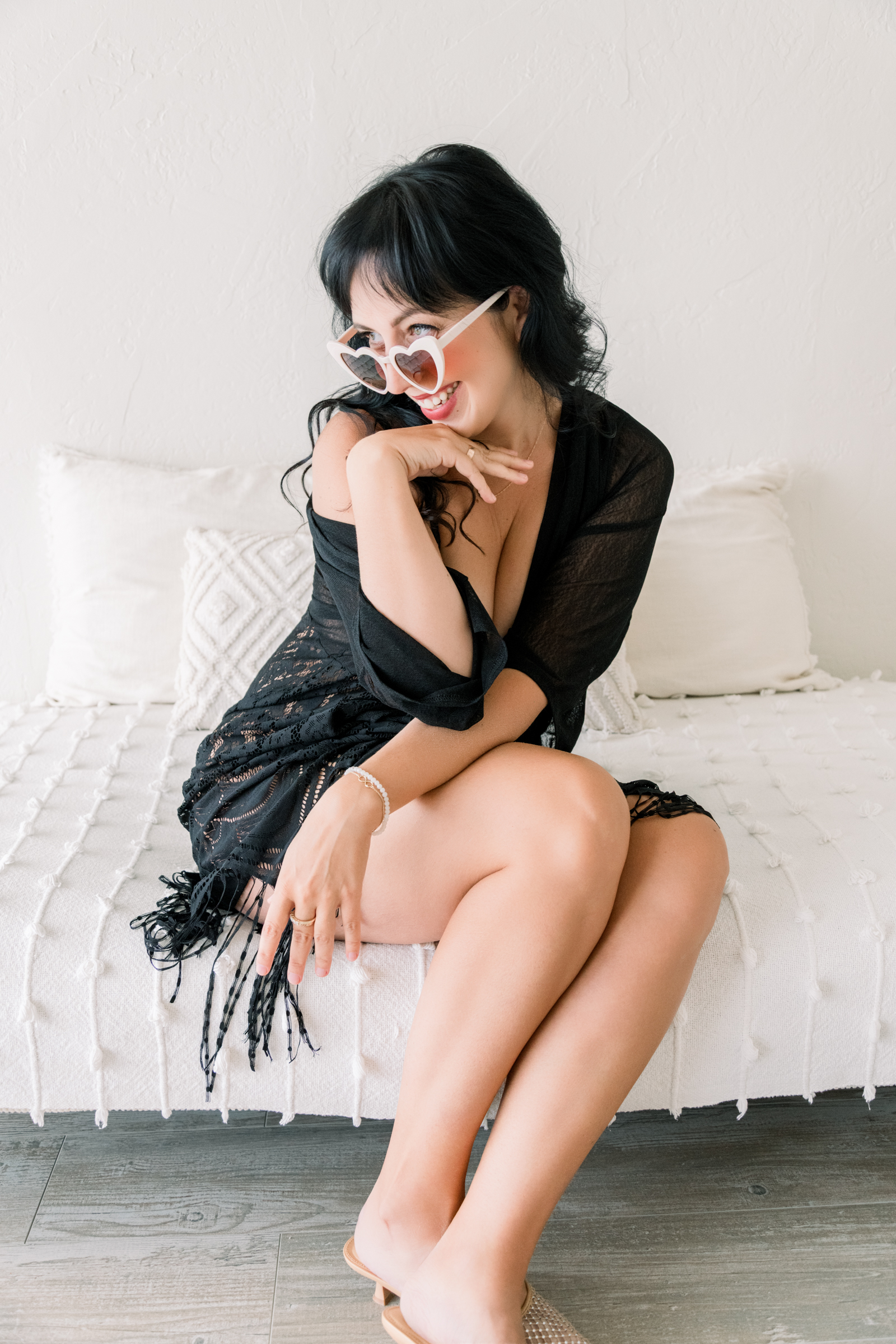 Boudoir photography is worth it through an empowering session where a woman embraces her beauty, confidence, and self-expression.