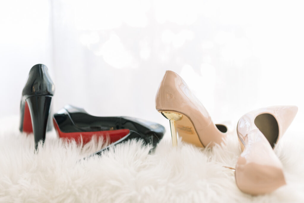 What to bring to a boudoir session: a selection of shoes to enhance your boudoir photography outfits.